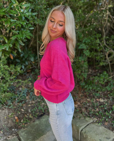 Pink cardigan sweater