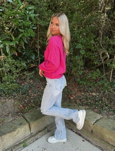 Pink cardigan sweater