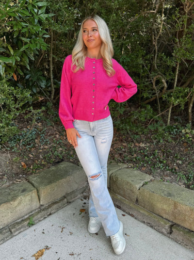 Pink cardigan sweater