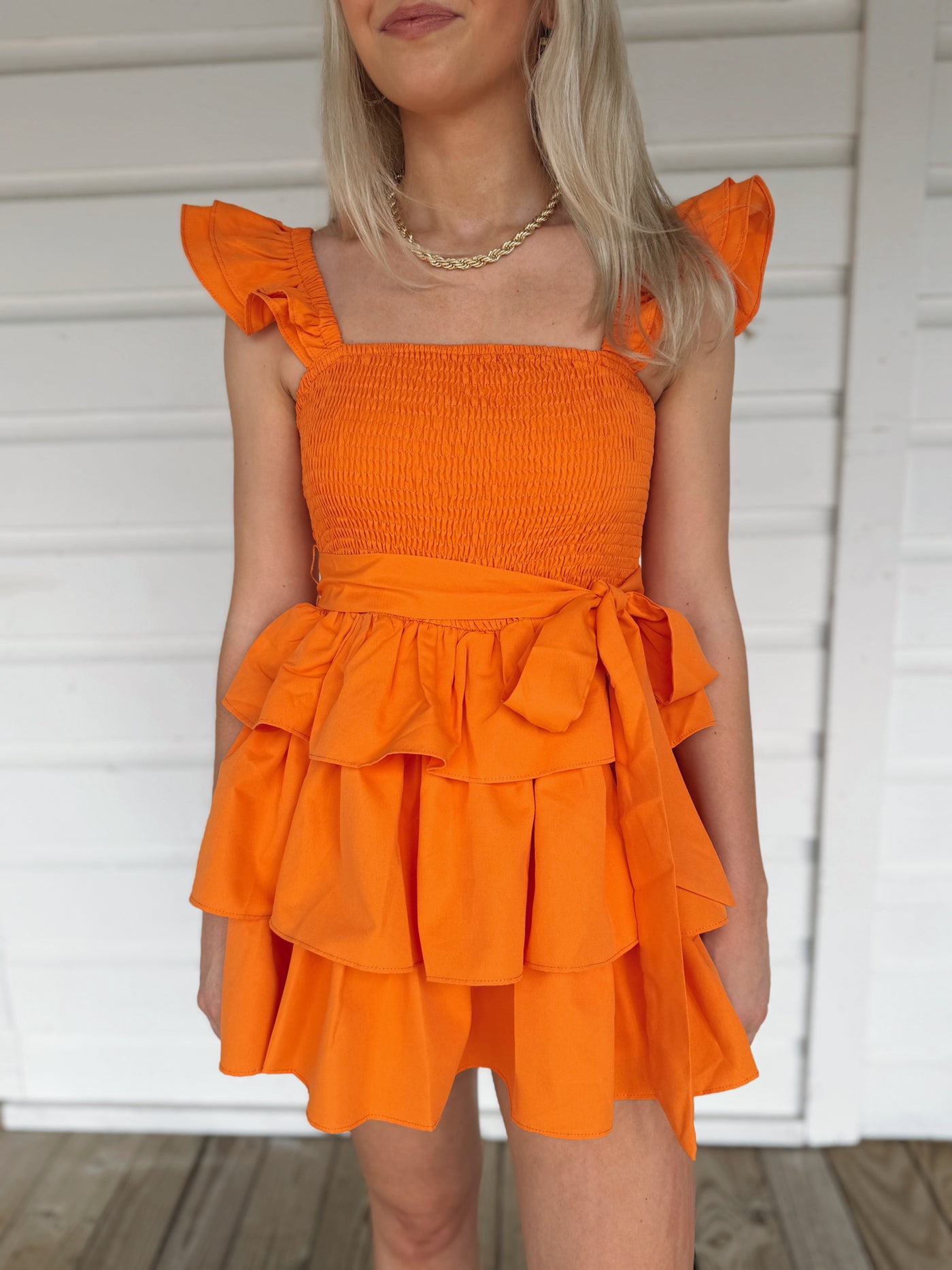 Orange Ruffle Tier Romper