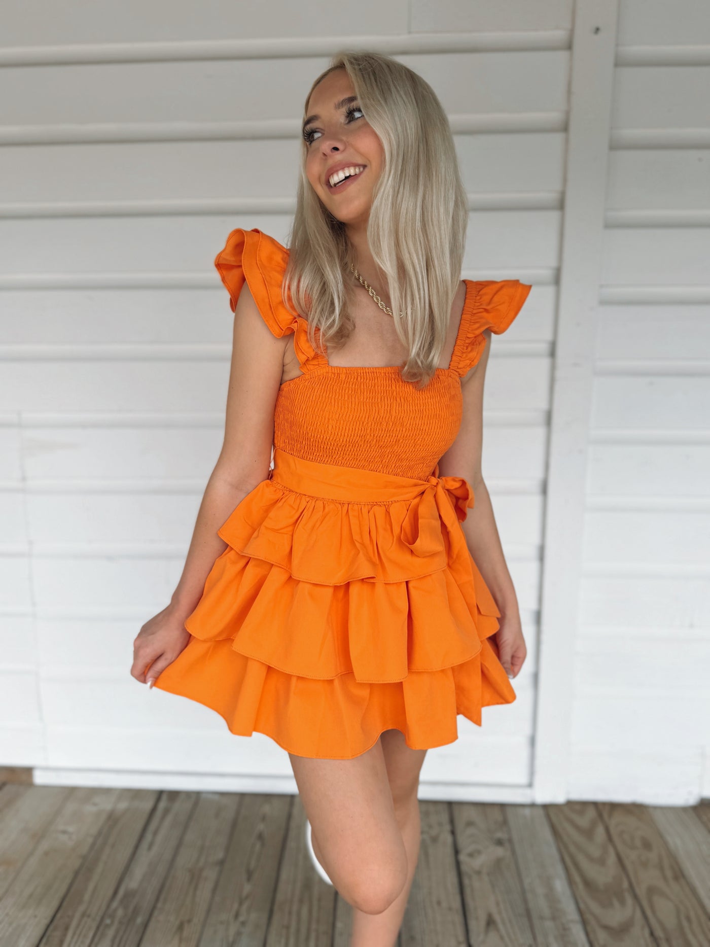 Orange Ruffle Tier Romper